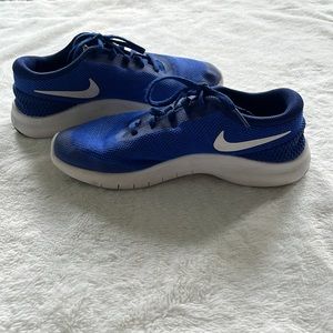 Previously owned Nike Blue Flex Experience an 7 tennis shoes